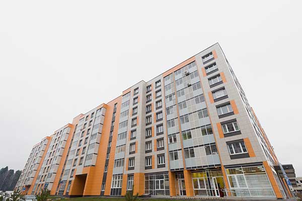 Облицовка зданий в микрорайоне Красногорский вентилируемыми фасадами из керамогранита